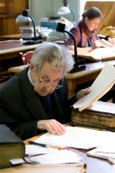 Leading Researcher of the Institute of Russian Literature (Pushkin House) O. Tvorogov in the  Manuscript Reading Room